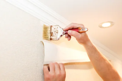 Pose de papier peint à Luceau — revêtements muraux et toiles de verre